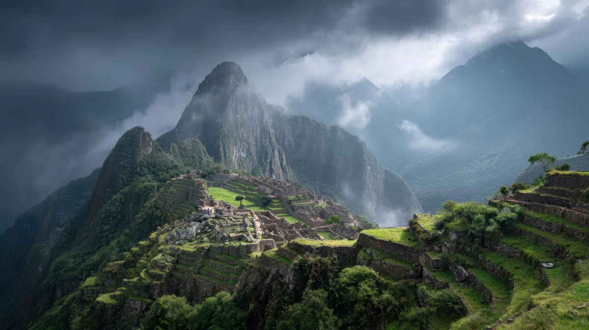 Machu Picchu with dramatic cloud atmosphere