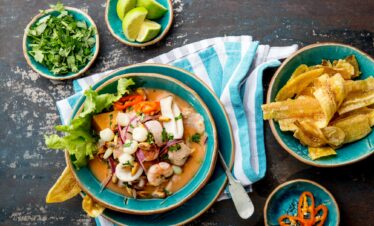 PERUVIAN CEVICHE SEBICHE. Peruvian seafood and fish ceviche with maize.